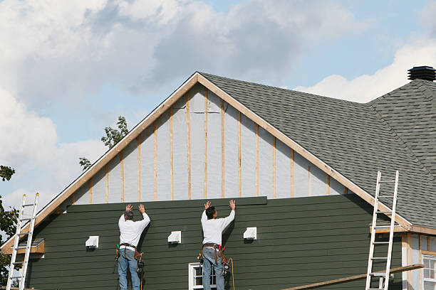 Professional Siding technician working in Seaboard, NC